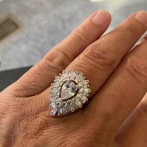 Lab created diamond ring. Authentic look brilliant shine. 3 layers w/baguettes